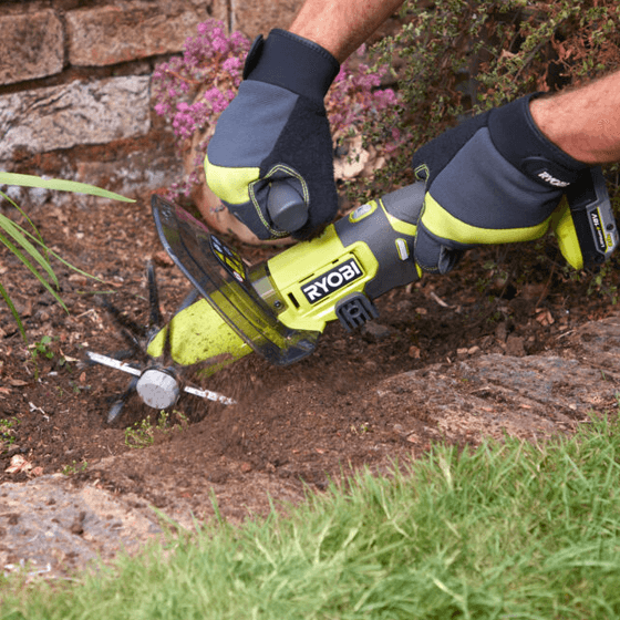 Cultivator being used on soil