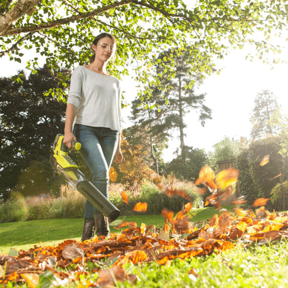 Woman using leafblower